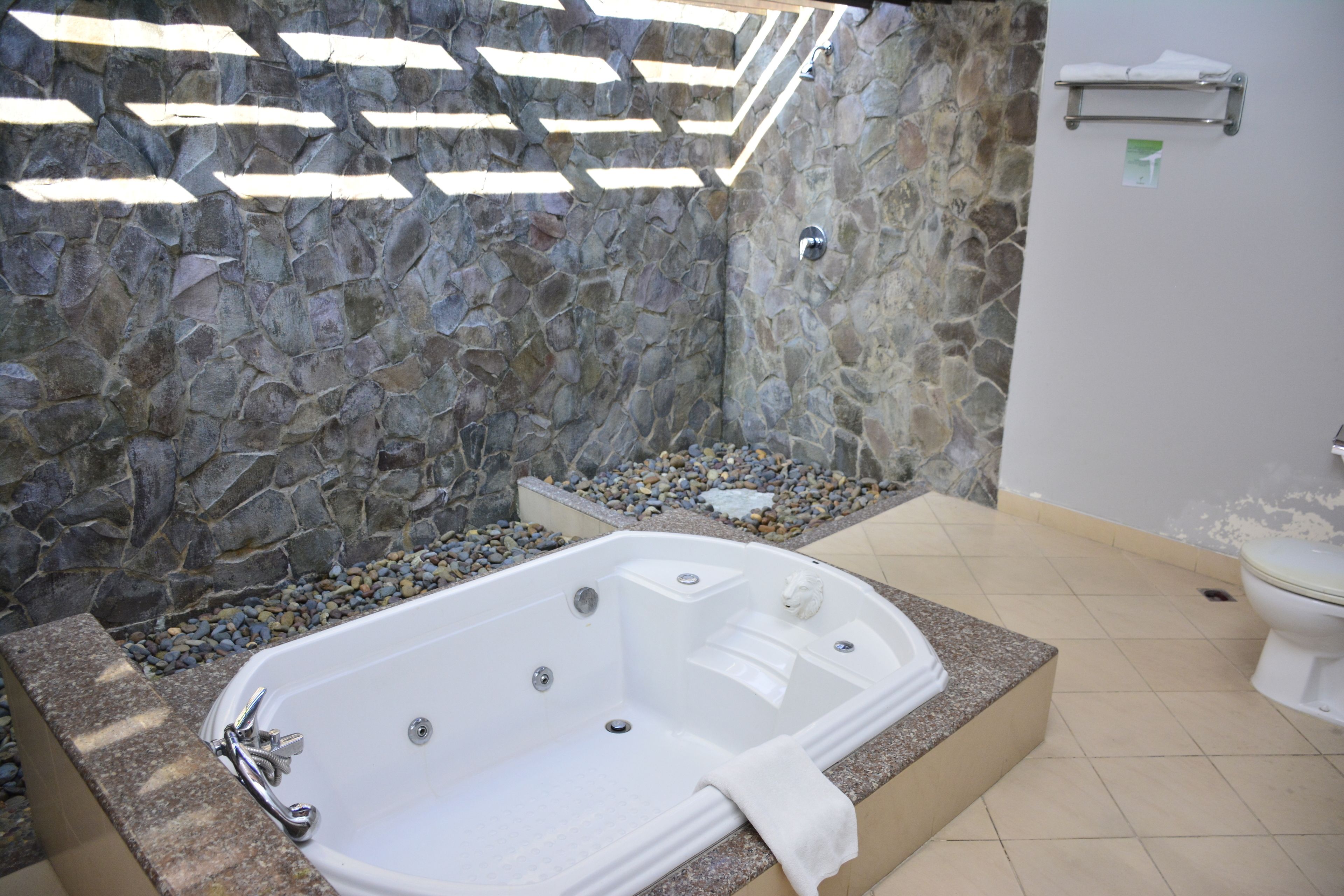 one bed room villa | bathroom | shower, towels, soap, shampoo