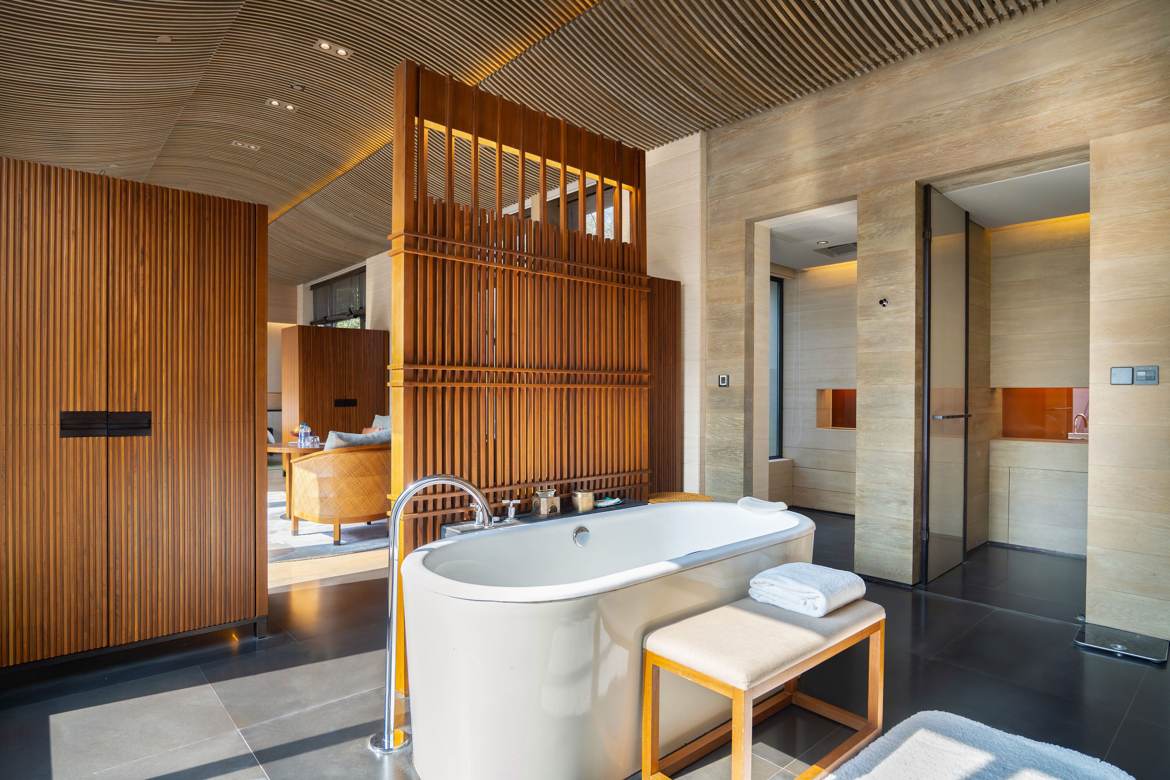 Courtyard Pavilion | Bathroom | Separate tub and shower, rainfall showerhead, hair dryer, bathrobes