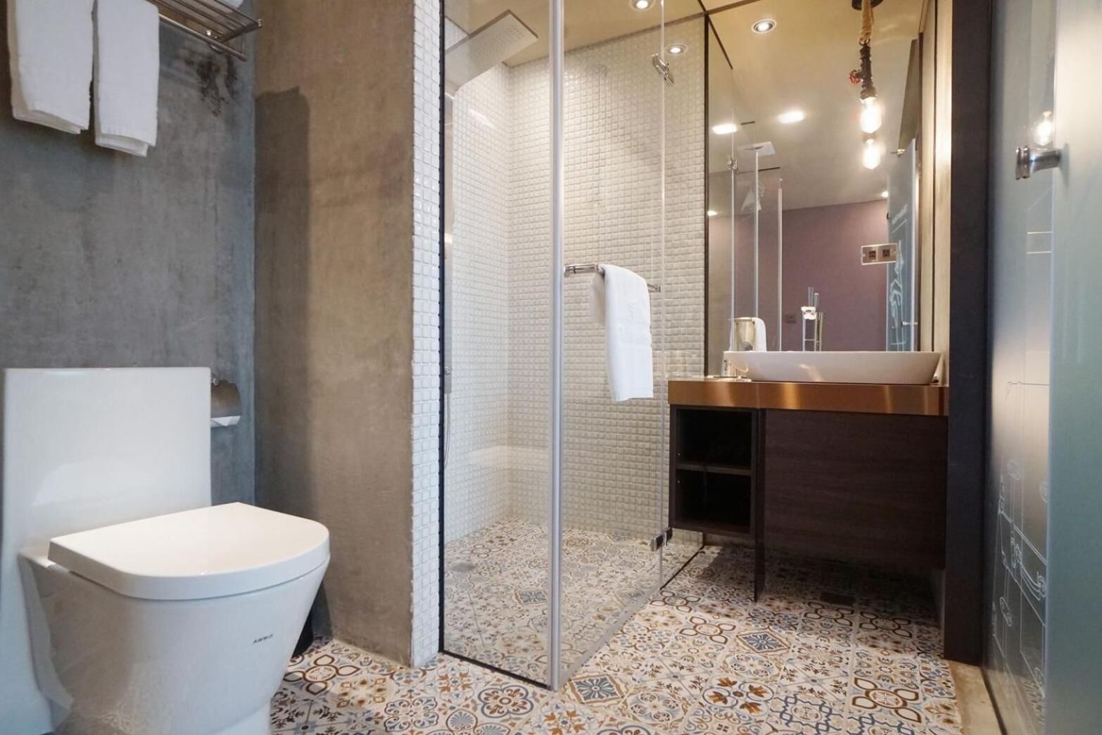 hair dryer, slippers, towels, shampoo