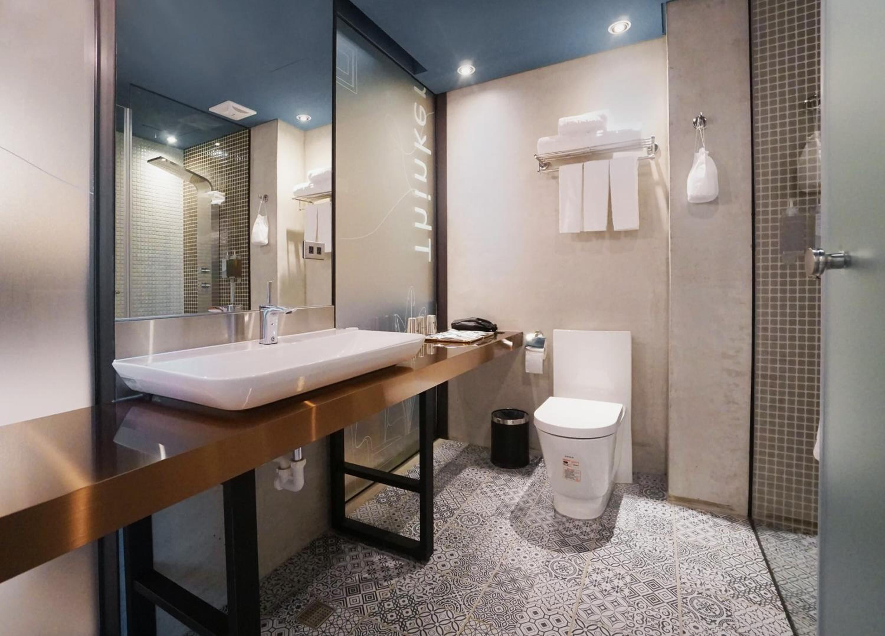 hair dryer, slippers, towels, shampoo