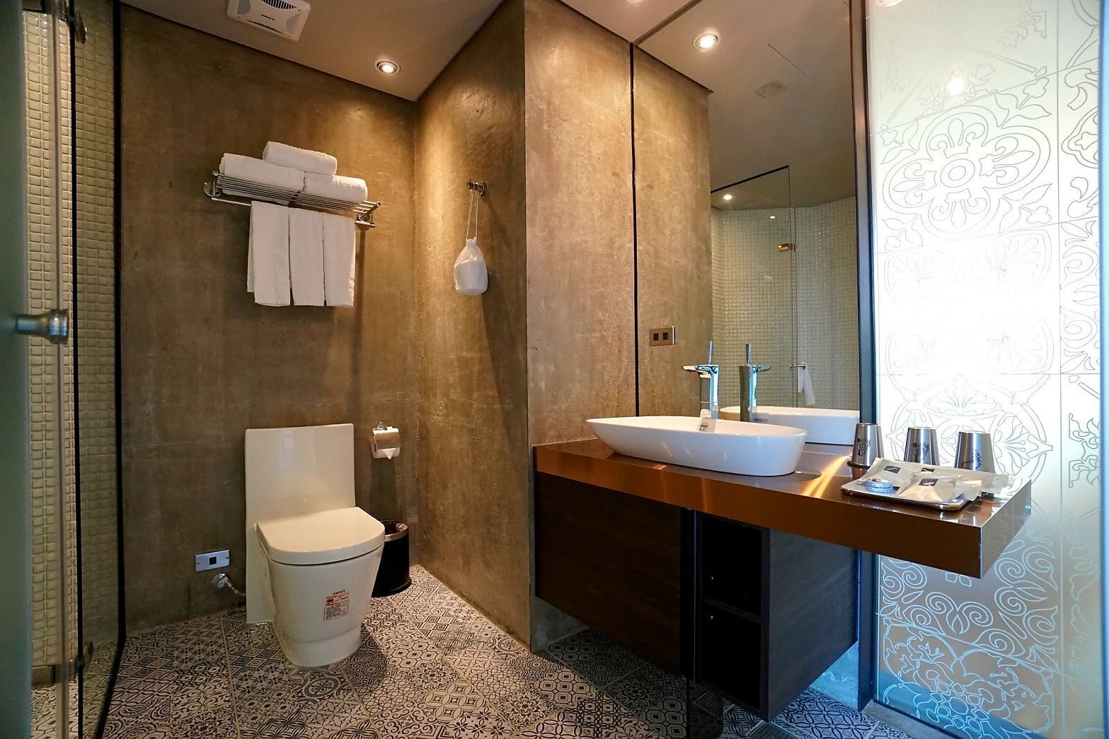 hair dryer, slippers, towels, shampoo