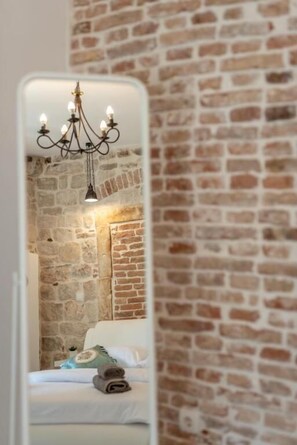 Klassieke studio suite | Een kluis op de kamer, individueel gemeubileerd