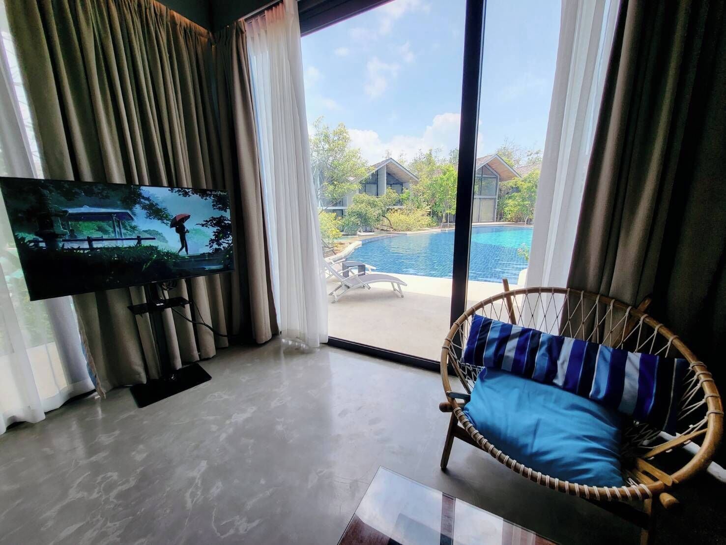 Two-Bedroom Villa Pool Access with Round-Trip Boat Transfer | Living area | 49-inch Smart TV with satellite channels, TV