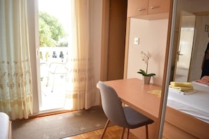 Desk, blackout curtains, free WiFi, bed sheets