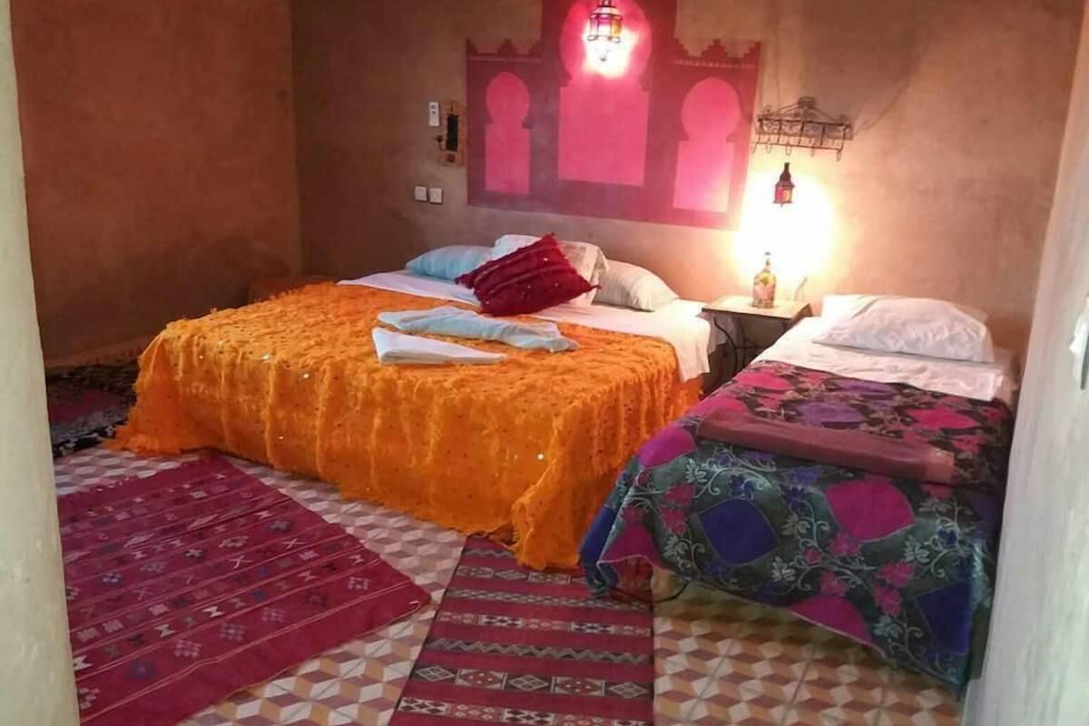 Quarto quádruplo, várias camas | Cortinas blackout, Wi-Fi de cortesia, roupa de cama