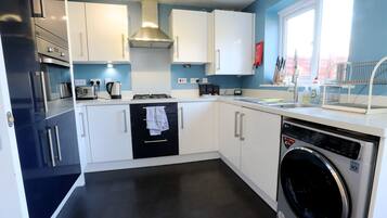 Premier House | Private kitchen | Fridge, microwave, stovetop, coffee/tea maker