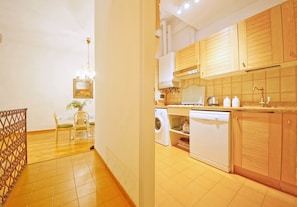 Apartment, 2 Bedrooms | Private kitchen | Full-size fridge, microwave, stovetop, dishwasher