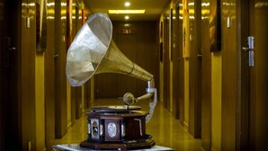 A hallway with a gramophone on display. - Le Raj Courtyard (Gummidipundi)
