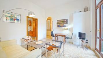 Apartment, 2 Bedrooms, Patio | Living area | Flat-screen TV