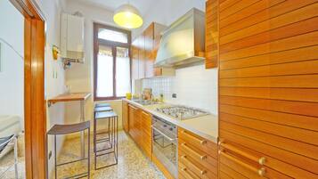 Apartment, 2 Bedrooms, Patio | Private kitchen | Full-size fridge, microwave, stovetop, toaster