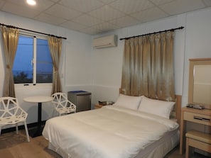 Desk, blackout curtains, soundproofing, rollaway beds