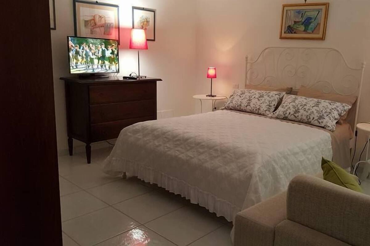 Desk, blackout curtains, iron/ironing board (on request)