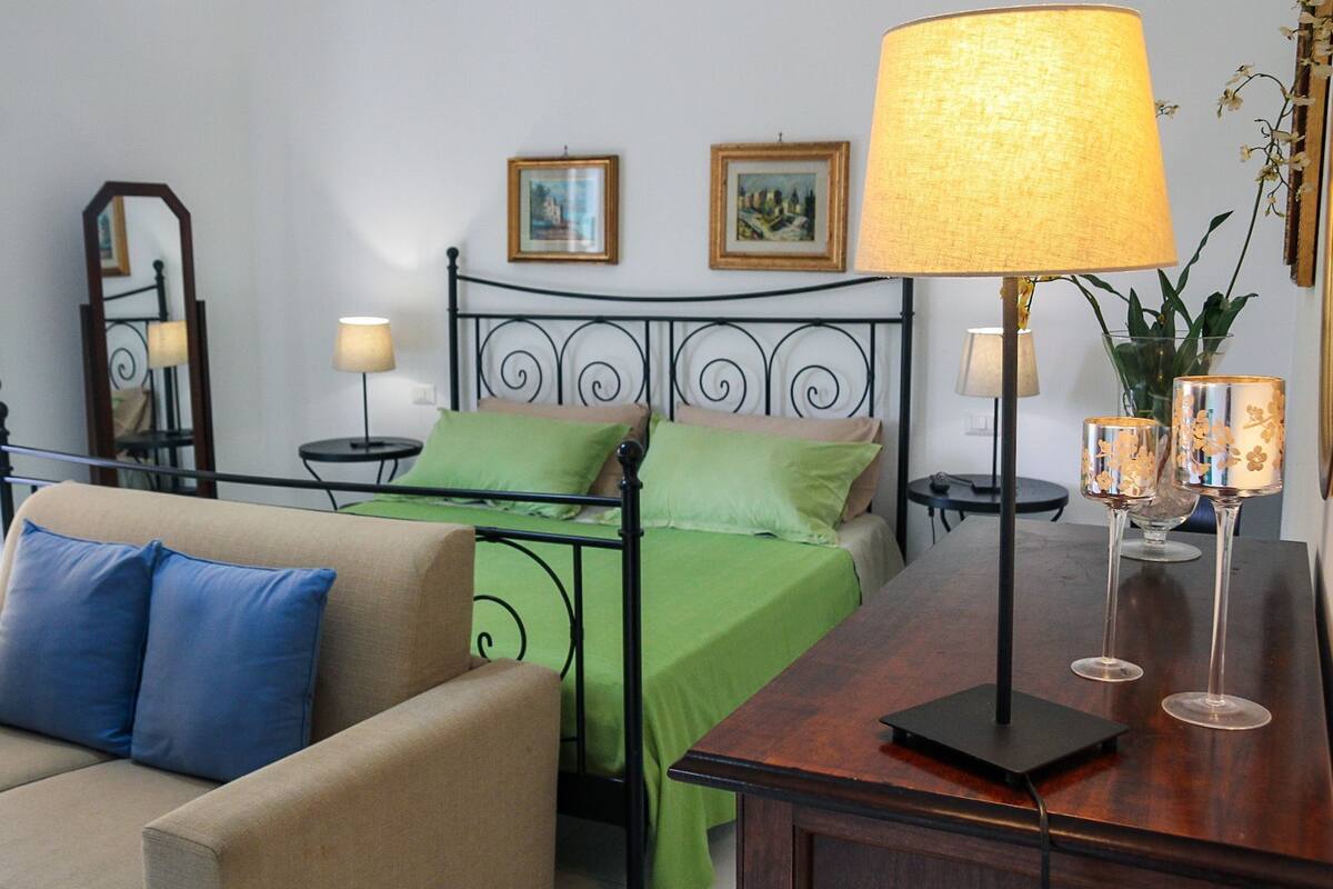 Desk, blackout curtains, iron/ironing board (on request)