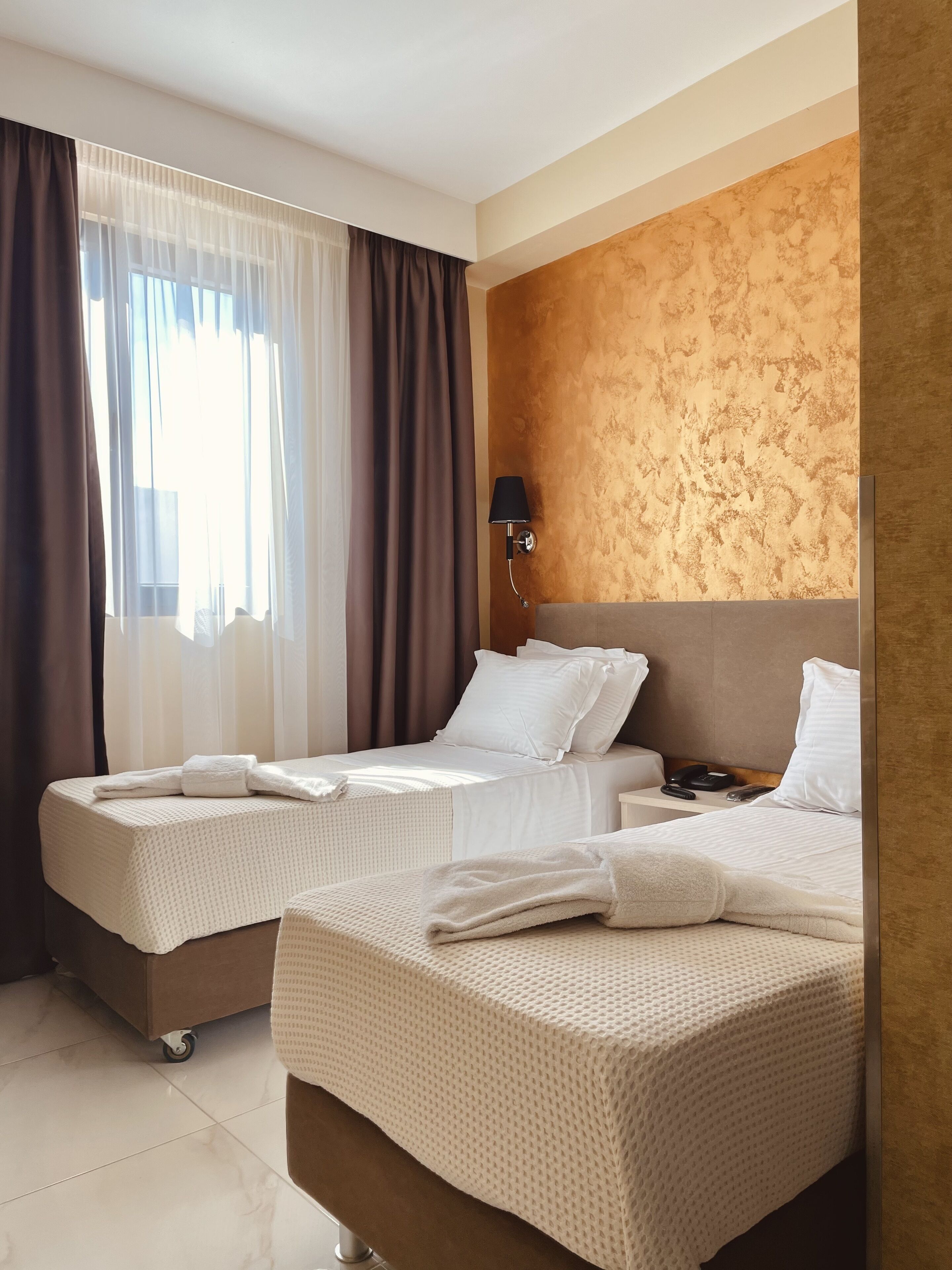 Hypo-allergenic bedding, minibar, in-room safe, individually decorated