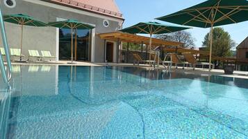 Indoor pool, outdoor pool, pool umbrellas, sun loungers