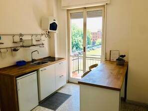 Apartamento, 1 quarto | Cozinha privada | Geladeira, cooktop, máquina de café expresso