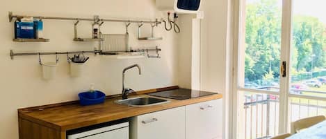 Apartemen, 1 kamar tidur | Dapur pribadi | Lemari es, kompor, mesin espresso, dan peralatan masak/sendok-piring