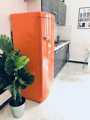 Apartment, 1 Bedroom | Private kitchen | Full-size fridge, stovetop, espresso maker, cookware/dishes/utensils - Tadino Studio (Milan)