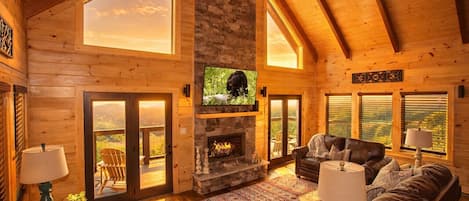 Televisión de pantalla plana, chimenea y videojuegos