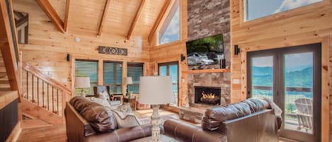 Flat-screen TV, fireplace, video games, DVD player