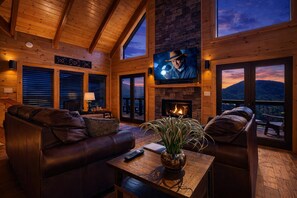 تلفزيون بشاشة مسطحة، مدفأة، ألعاب فيديو، مشغل دي في دي