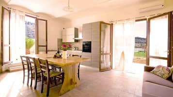 Apartment (Arundineto Borgo "Piano Terra") | Private kitchen | Full-size fridge, stovetop, dishwasher, coffee grinder