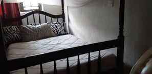 Individually decorated, individually furnished, desk, laptop workspace - Lado Hotel (Masindi)