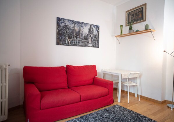 Departamento, 1 habitación | Área de sala de estar | Televisión de pantalla plana 