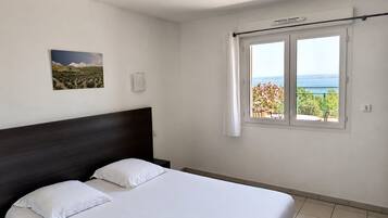 1 dormitorio y ropa de cama de alta calidad