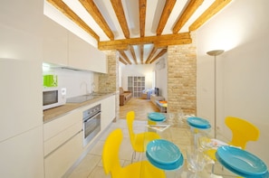 Apartment, 1 Bedroom | Private kitchen | Full-size fridge, microwave, oven, stovetop