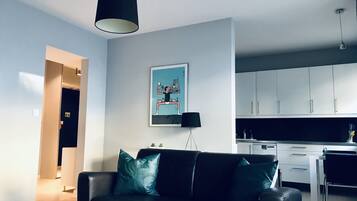 Deluxe Apartment, 1 Bedroom, Non Smoking, Kitchen | Living room | Flat-screen TV