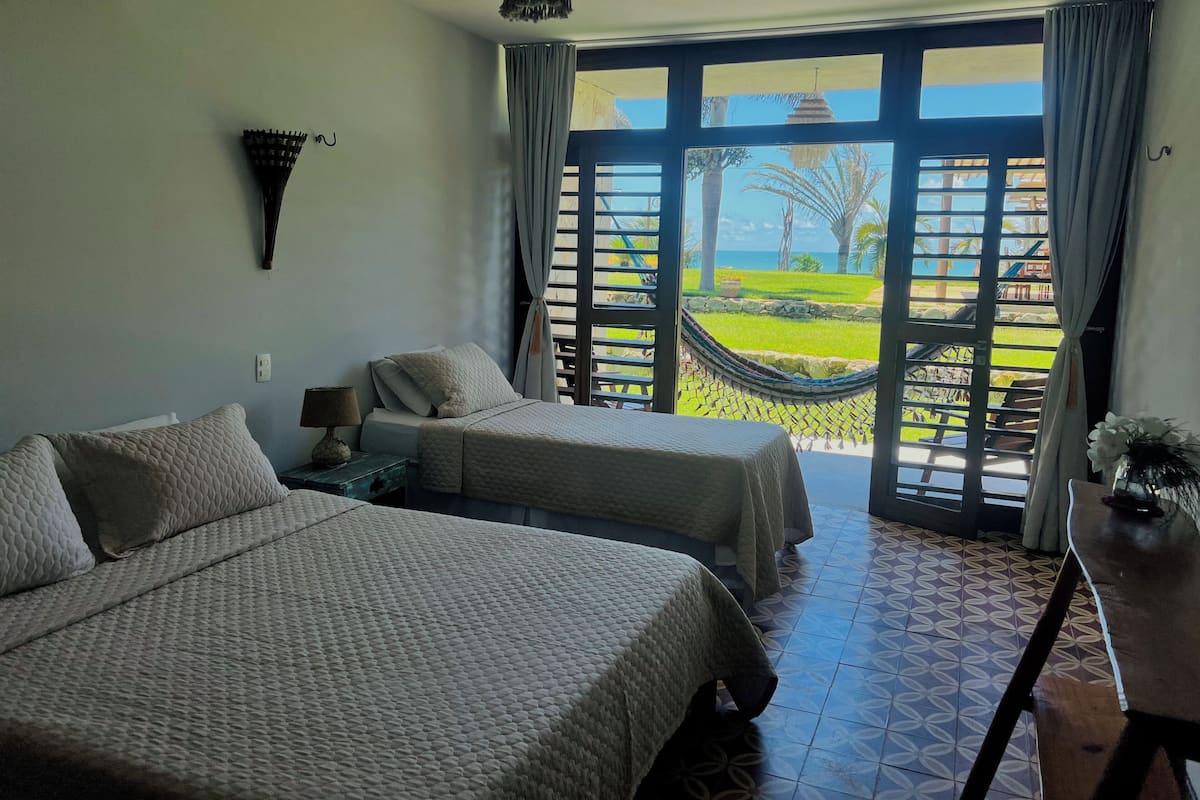 Habitación doble | Ropa de cama de alta calidad y minibar
