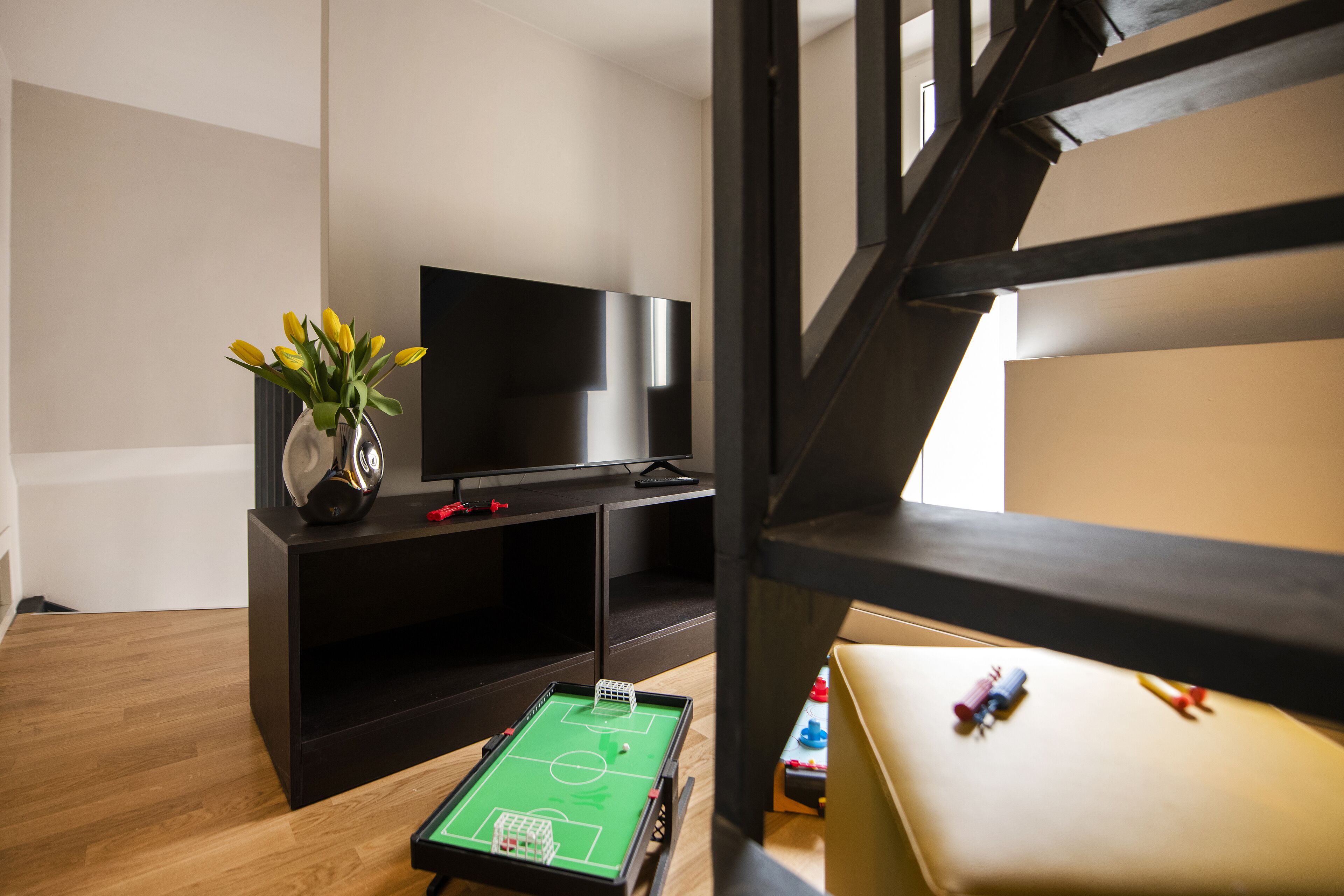 panoramic apartment, annex building (piazza di spagna 66) | living area | flat-screen tv