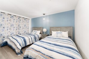 Two Double Beds Suite | 1 bedroom, desk, blackout drapes, travel crib