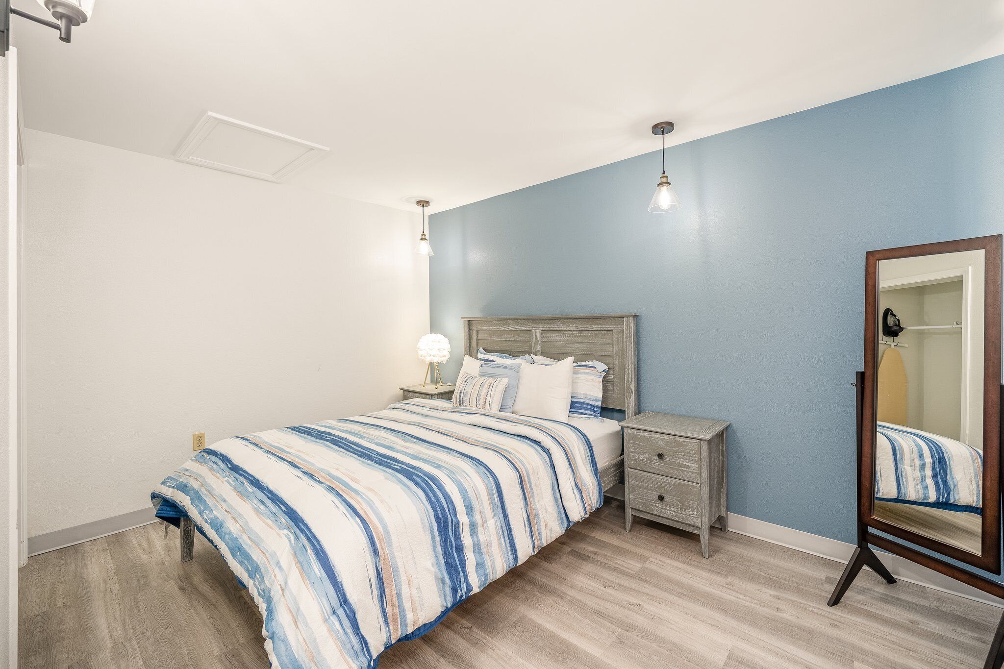 one-bedroom suite | 1 bedroom, desk, blackout curtains, travel cot