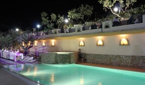 Seasonal outdoor pool, open 8:00 AM to 8:00 PM, pool umbrellas