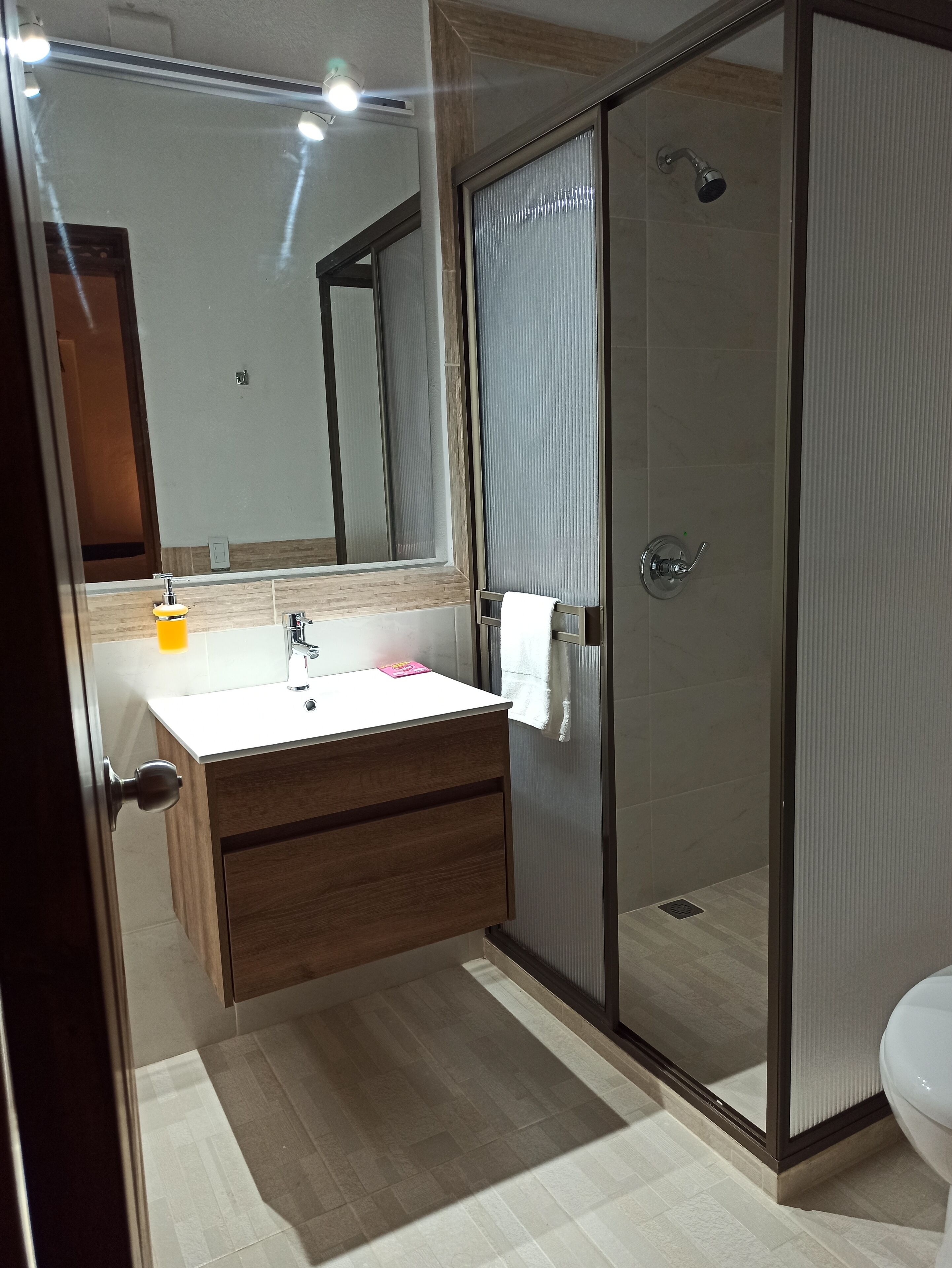 shower, free toiletries, towels, soap