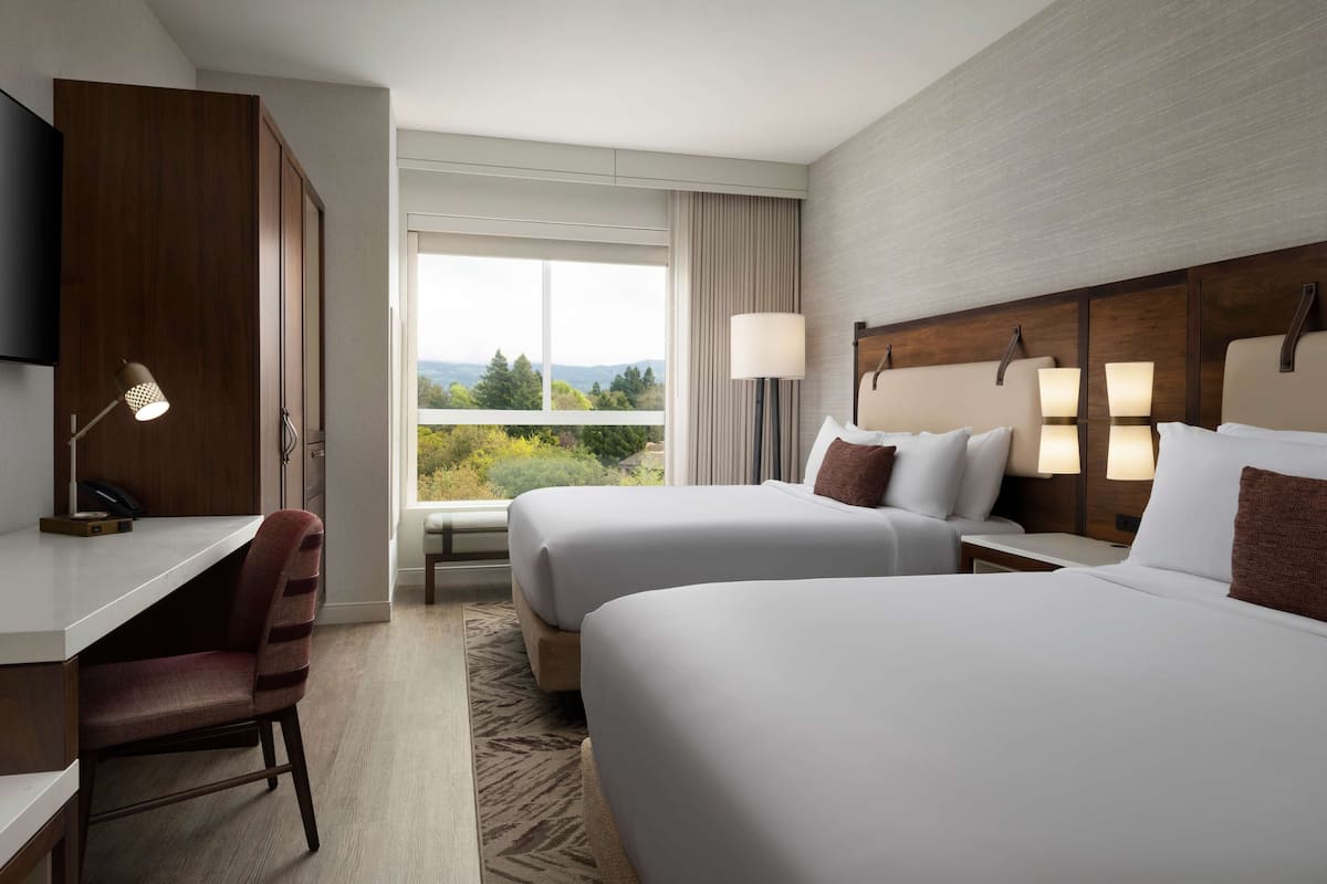 Premium bedding, pillow-top beds, in-room safe, desk