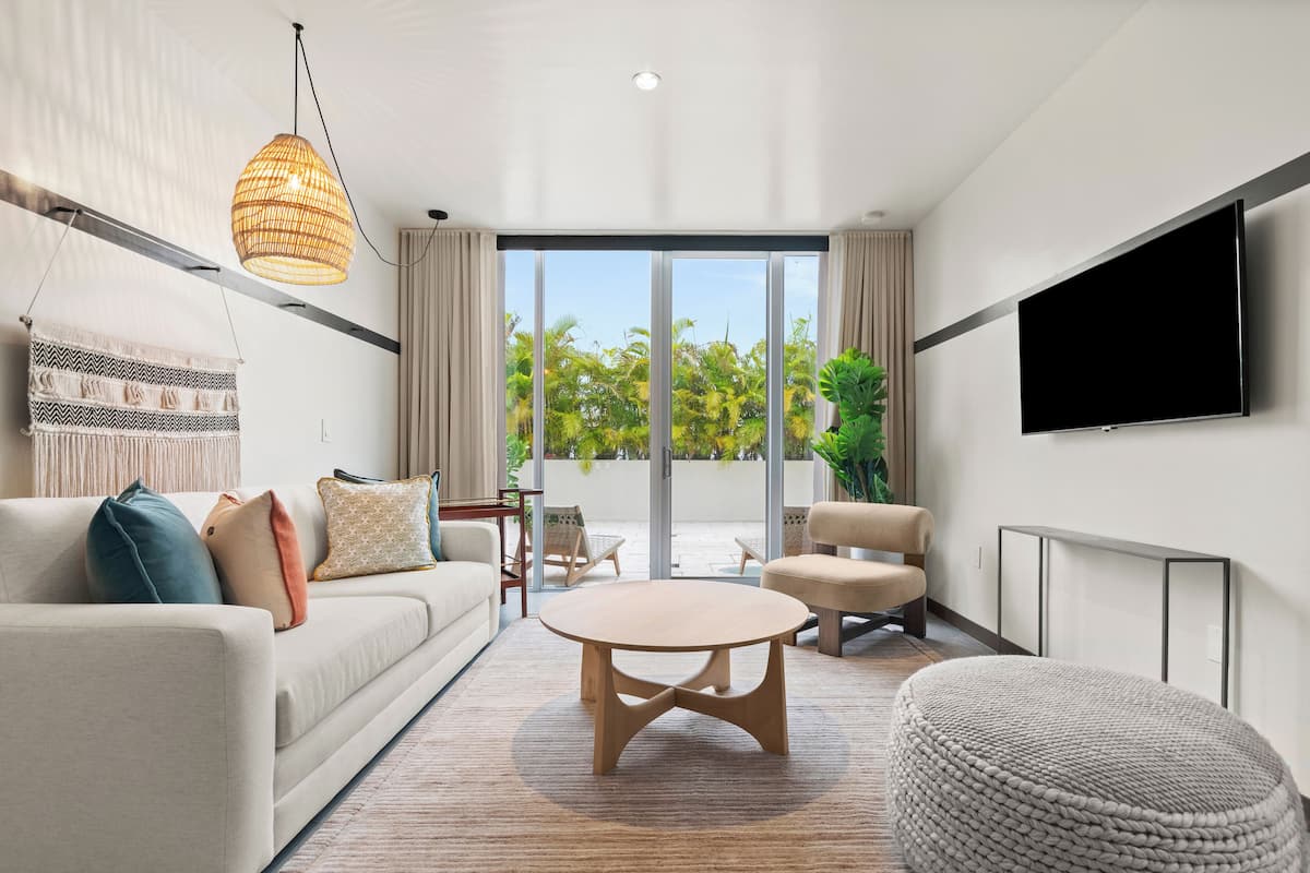 Two-bedroom Suite | Living area | 42-inch flat-screen TV with digital channels, TV, streaming services
