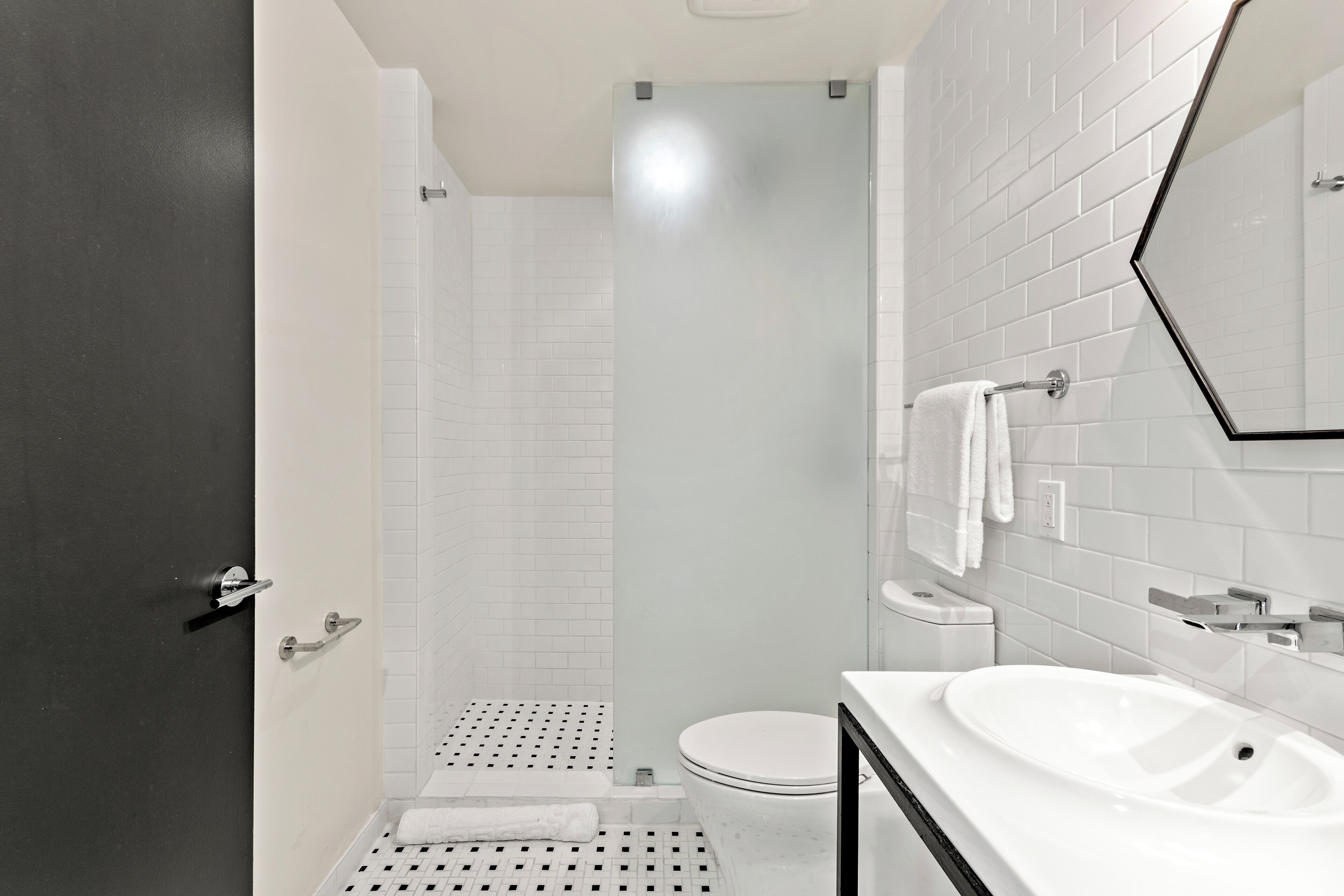 king suite with balcony | bathroom | shower, rainfall showerhead, free toiletries, hair dryer