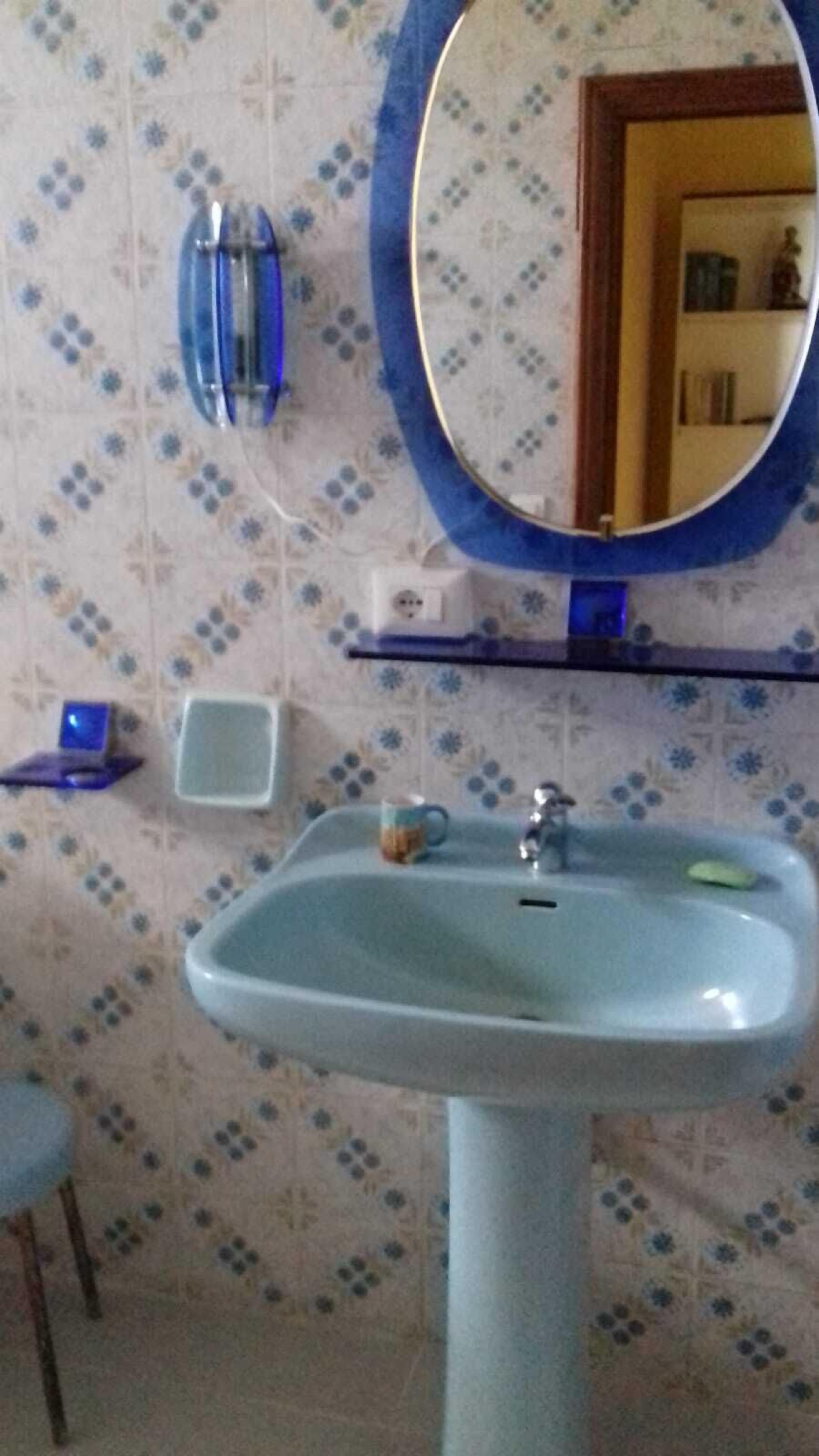 combined shower/bathtub, deep-soaking bathtub, rainfall showerhead