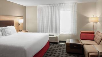 Desk, blackout drapes, iron/ironing board, free cribs/infant beds