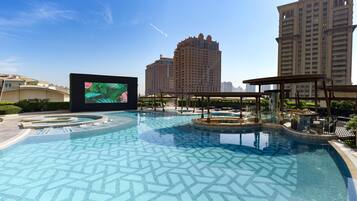 Outdoor pool, open 9:00 AM to 11:00 PM, pool umbrellas, pool loungers