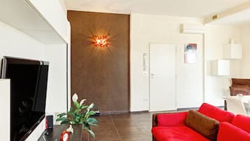 Apartment, 2 Bedrooms | Living area | Flat-screen TV