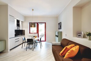 Apartment, 1 Bedroom (Bainsizza 3/5) | Living area - Maggiore Residence Flats (Bologna)
