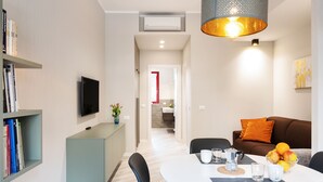 Apartment, 1 Bedroom (Bainsizza 3/3) | Living area | Flat-screen TV - Maggiore Residence Flats (Bologna)