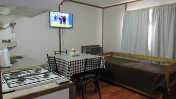 Cabana família | Área de estar | Smart TV 24 polegadas com canais de TV premium, TV, Netflix