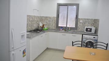 Apartment | Private kitchen | Fridge, microwave, stovetop, espresso maker