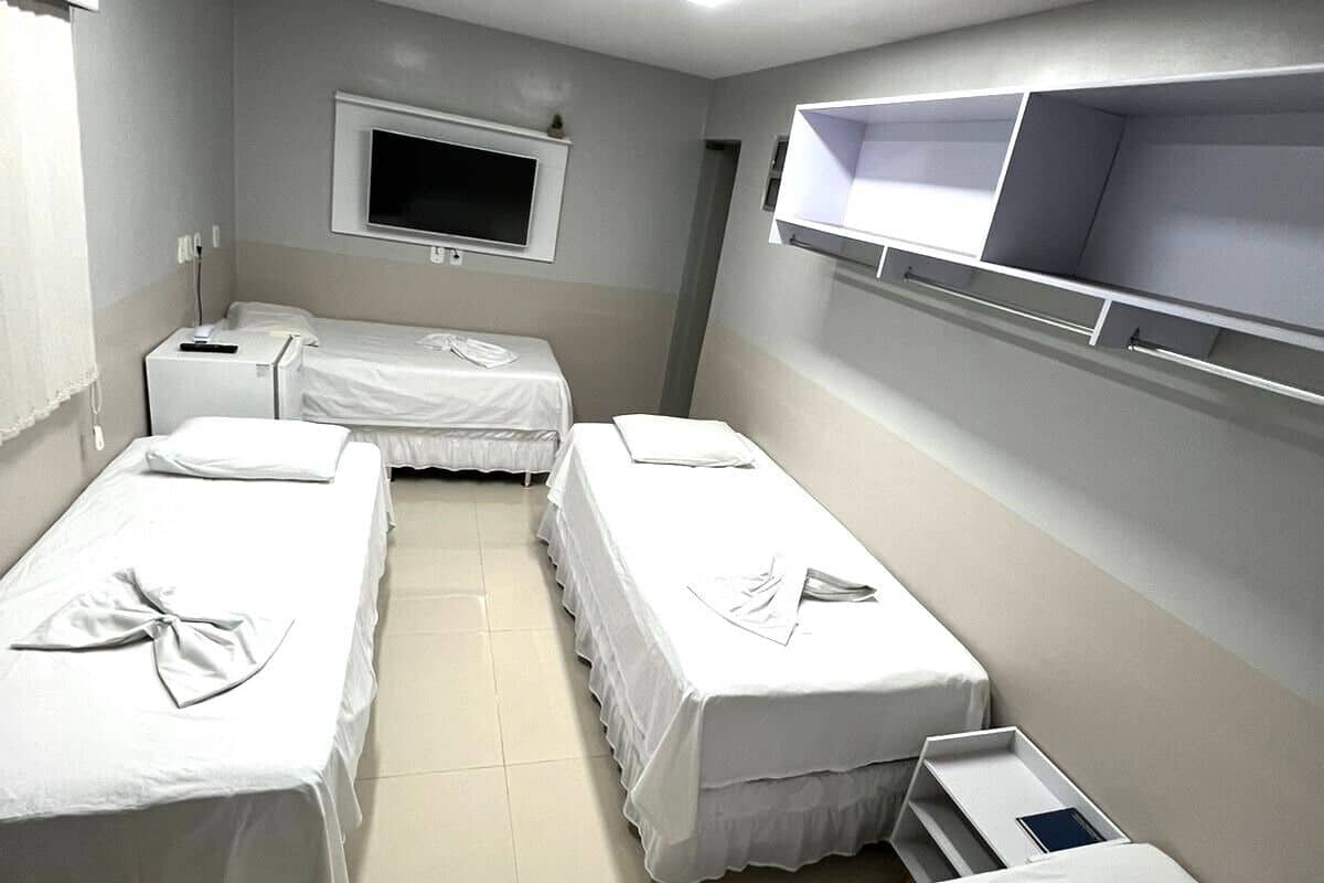 Chambre Quadruple | Literie hypoallergénique, minibar, rideaux occultants, Wi-Fi gratuit