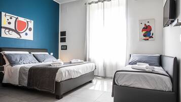 Down comforters, memory foam beds, in-room safe, desk